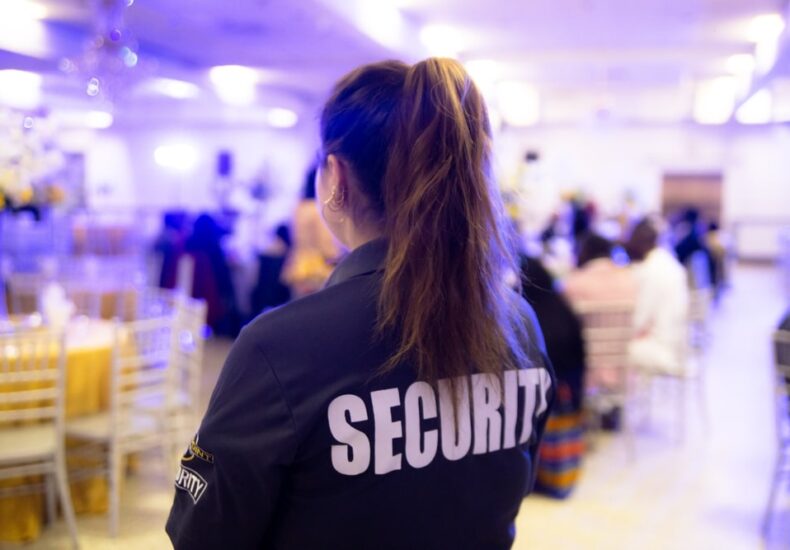 Security guard inside a restaurant keeping watch